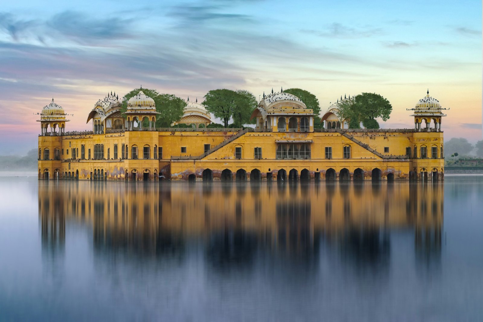 The pink sandstone facade of the City Palace in Jaipur