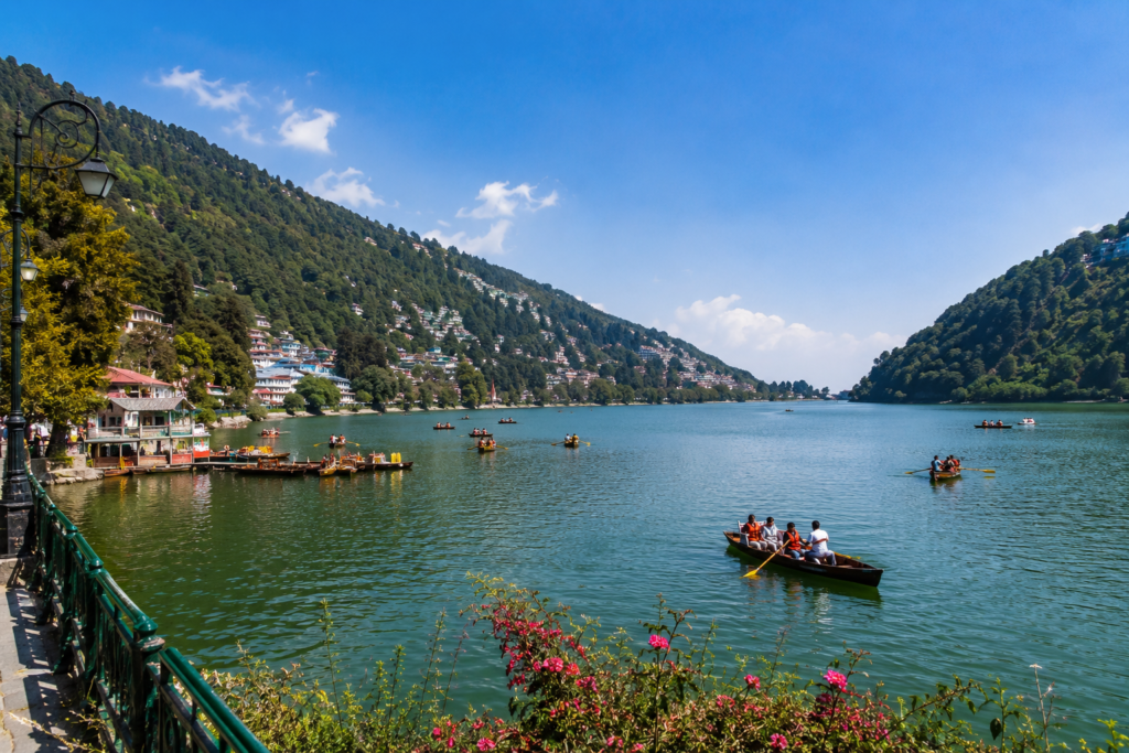 Naini Lake surrounded by hills and the town of Nainital