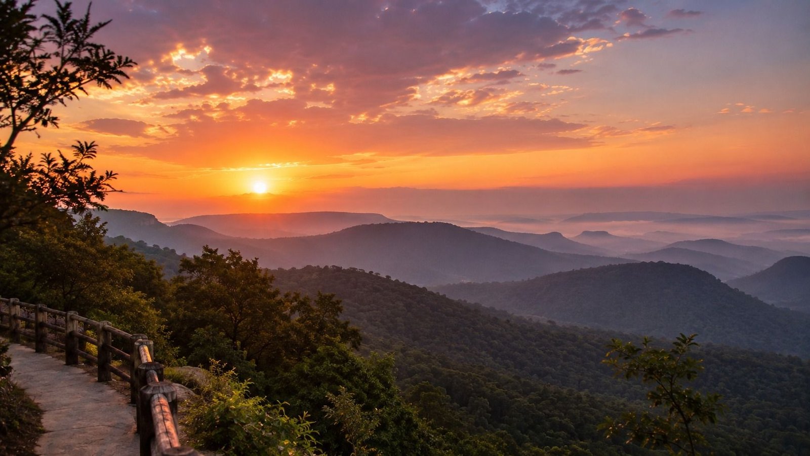 A misty sunset viewpoint over the forested Dang hills at Saputara, Gujarat