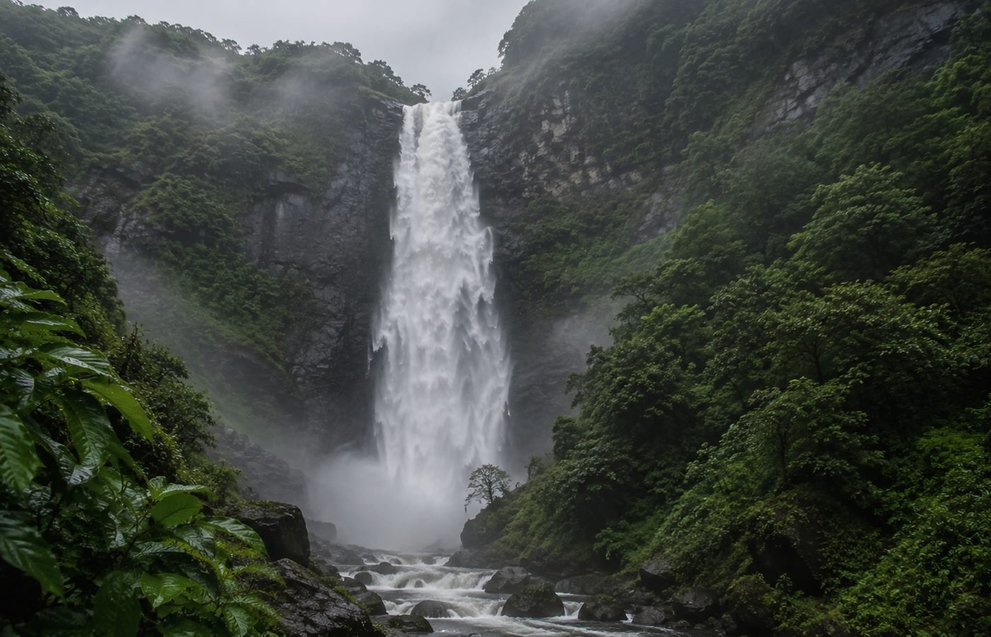 Randha Falls in full monsoon flow near Bhandardara, the Pravara river plunging into a green gorge