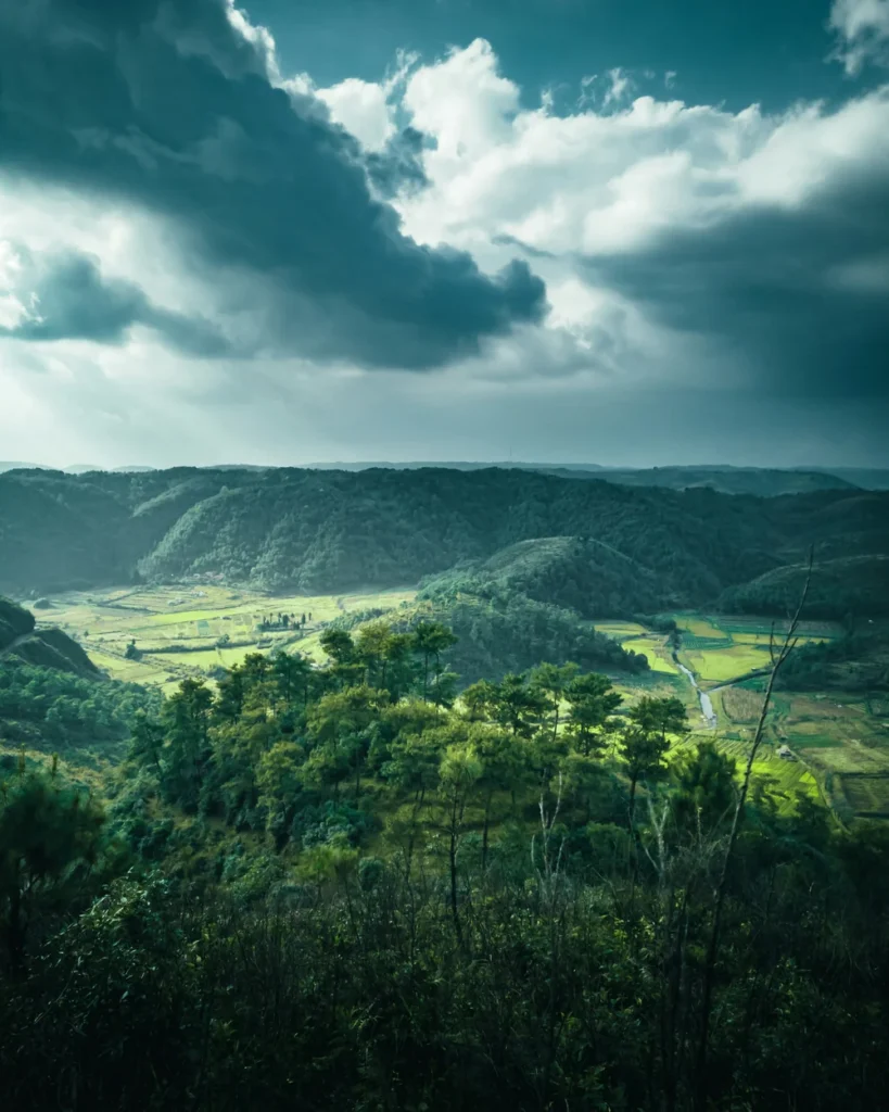 Green Khasi hills valley under heavy monsoon cloud, Meghalaya