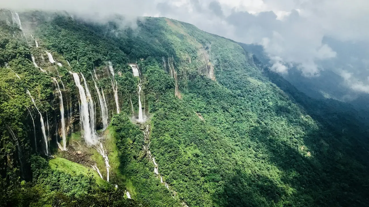 The Seven Sisters Falls dropping off the escarpment at Sohra, Meghalaya