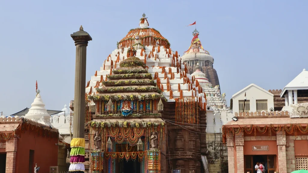 The Jagannath Temple in Puri, Odisha — the main tower and the Aruna Stambha pillar